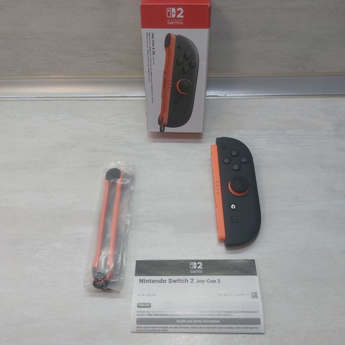 Оригинален Десен Контролер Joy-Con 2 за Nintendo Switch 2 (Light Red) • Пълен комплект с кутия