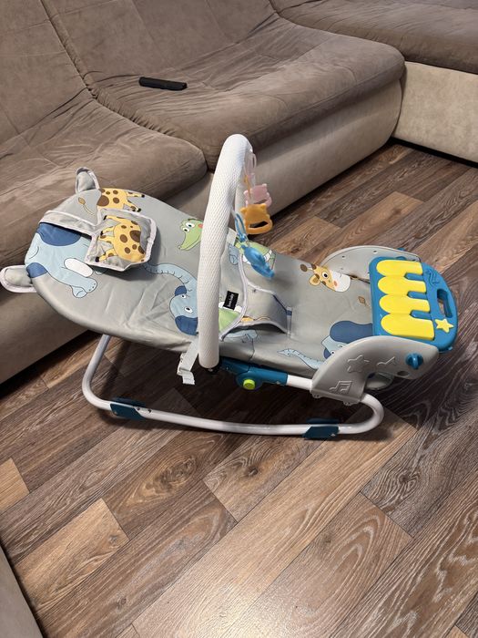 Детский музыкальный  шезлонг.