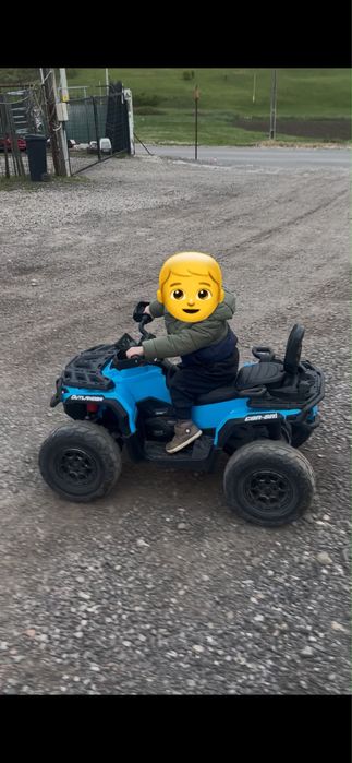 ATV electric 4x4 Can-Am Outlander, 2 copii, 24V, roti cauciuc EVA, albastru