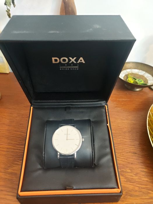 Vând două ceasuri Doxa și Atlantic