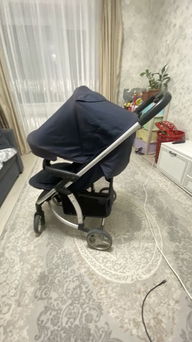Коляска темна синий