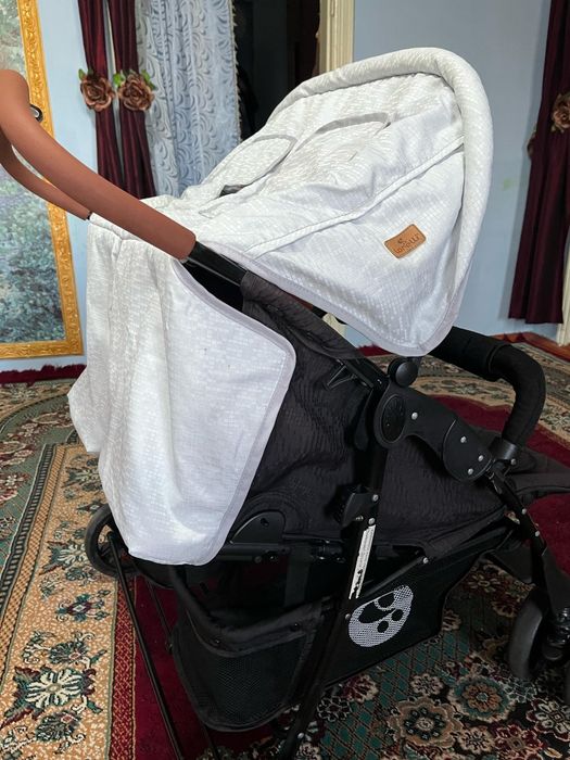 Коляска для двойни фирмы Лорелли