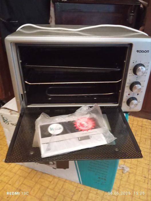 Продам электрическая духовка Roison