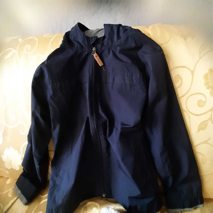 Дождевик синего цвета для мальчика 7-8 лет марки CARTERS