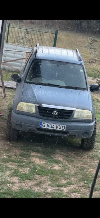 Suzuki grand vitara   Vand/Schimb cu atv cf moto sau altele