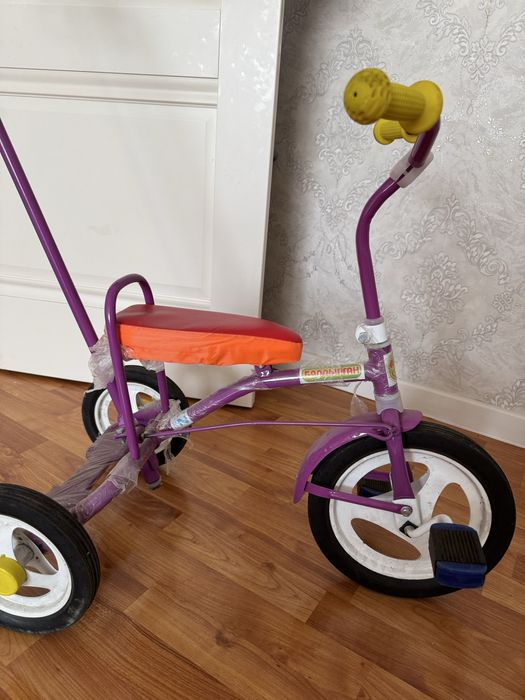 Продам велосипед с ручкой