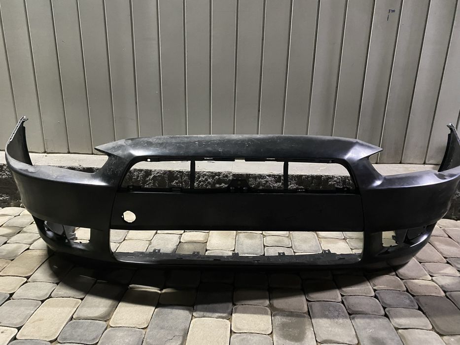 Передний бампер Mitsubishi Lancer 10