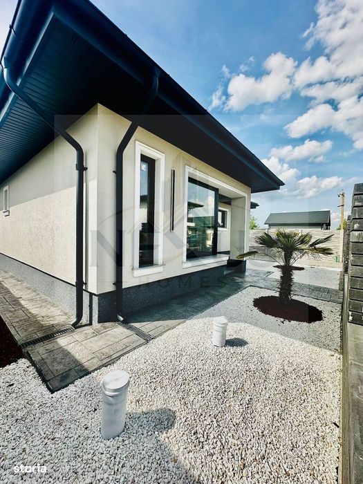 Casa individuala - 4 camere- Teren 375 mp - 2 bai - Terasa