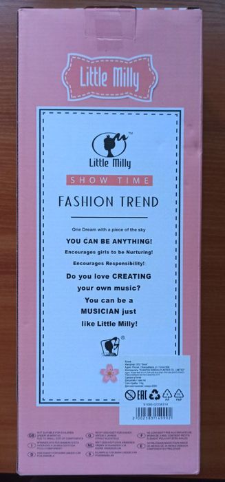 Элегантная новая кукла в коробке