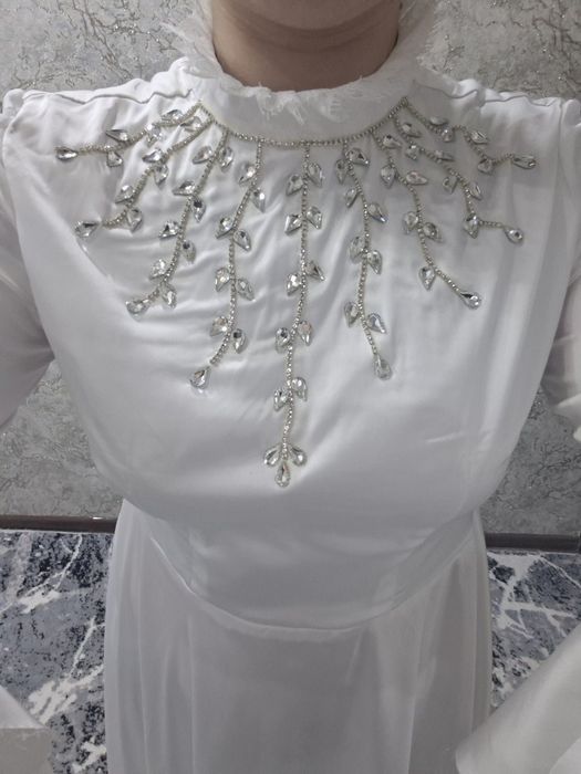 Oq ansabilni ostida kiyadigan ko'ylak sotiladi holati yaxshi