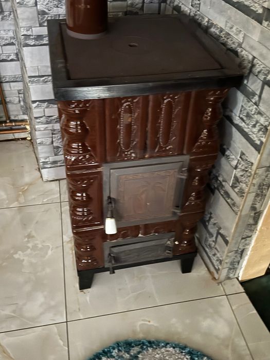 Soba teracotă în stare perfectă de funcționare