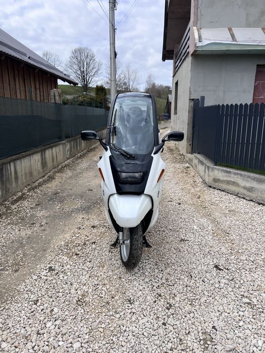 Bmw C1 125cc inmatriculat in uk pe numele meu