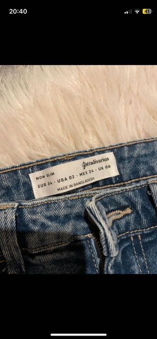 Blugi stradivarius cu taieturi