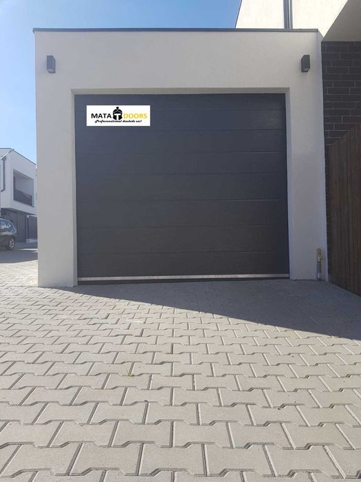 Distribuim la cel mai bun pret usi de garaj-TRANSPORT GRATUIT