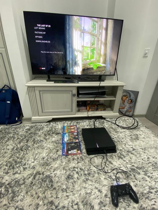 Consolă Playstation 4 Fat, negru mat + 2 manete + 3 jocuri PS4