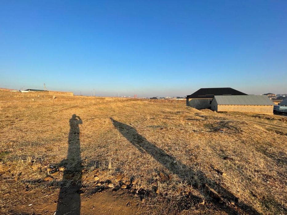 Участок с времянкой район Туран