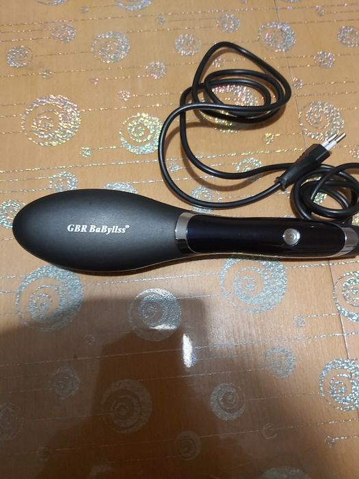 Четка за изправяне на коса