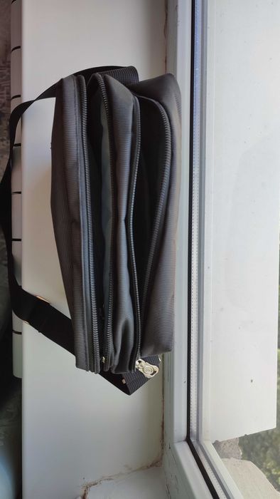 Продам качественную сумку Qidelong