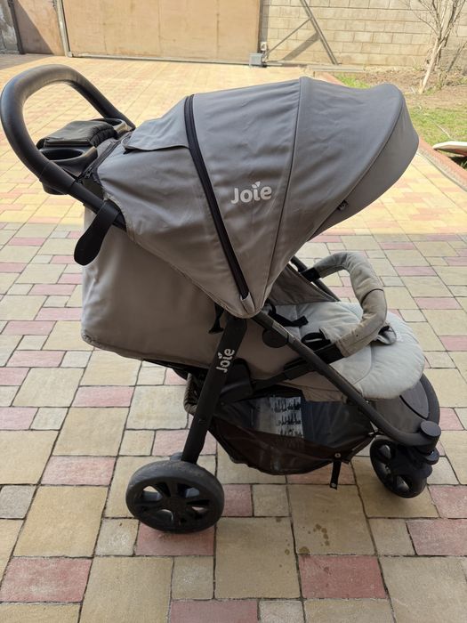 Коляска joie серая