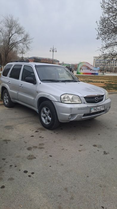 Мазда трибют 2,3