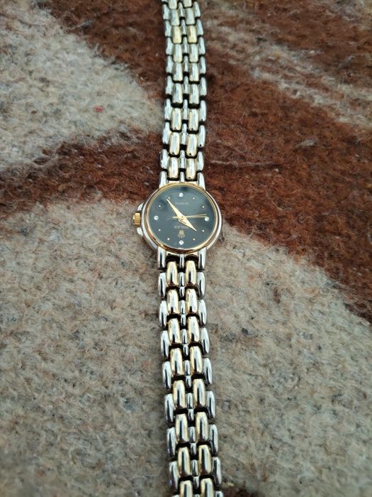 2бр дамски часовници ролекс и белучи