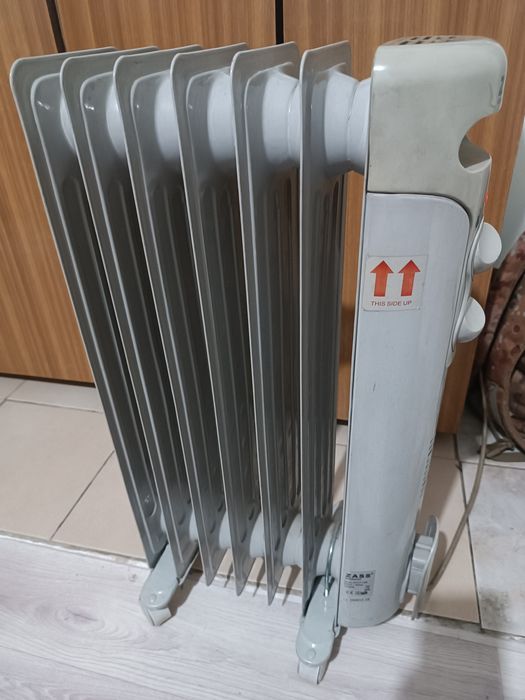 Масляный обогреватель