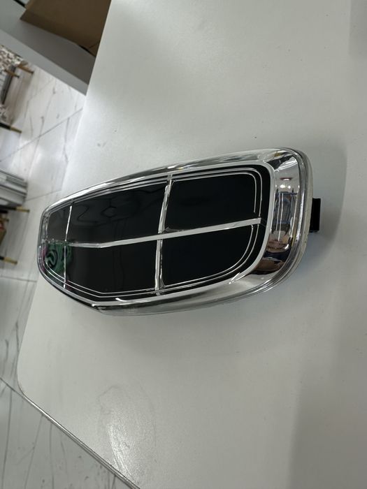 Geely Emgrand эмблема