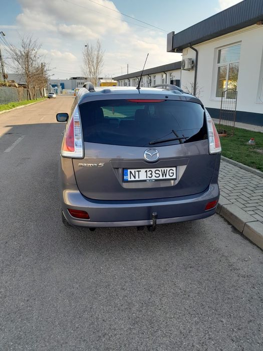 Vând  mazda 5  benzină
