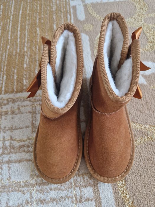 Продам новый зимний комбинезон