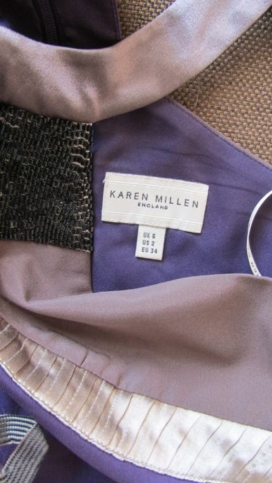 Продавам прекрасна , елегантна ,нова блуза Karen Millen