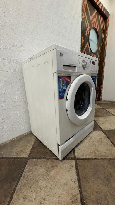 Cтиральную машину модель  LG.