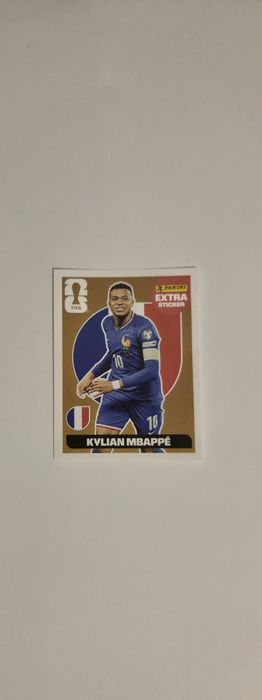 Panini World Cup Mbappe gold extra sticker.