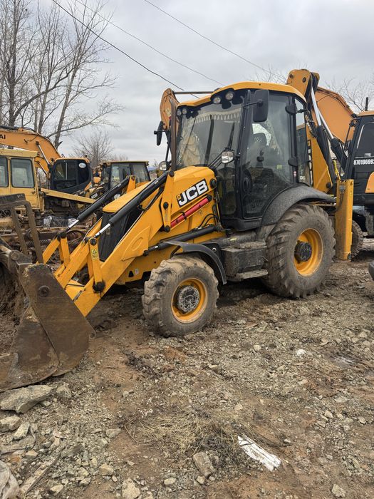 Погрузчик эксковатор три в одном JCV экскаватор