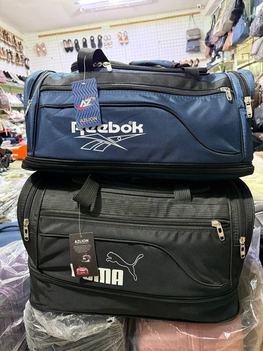 Turli xildagi sumkalar rassiya uchun sport va turli yoʻldagi sumkalar