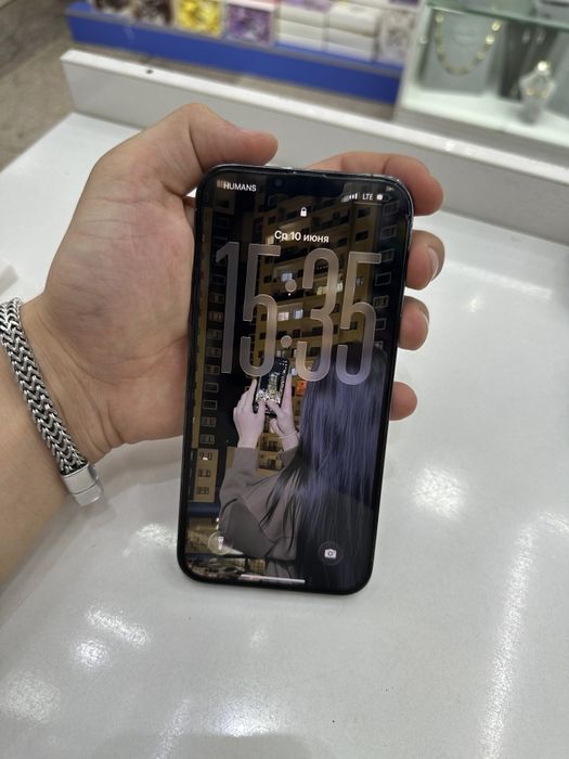 IPhone 13 pro max qiz bola ishlatgan