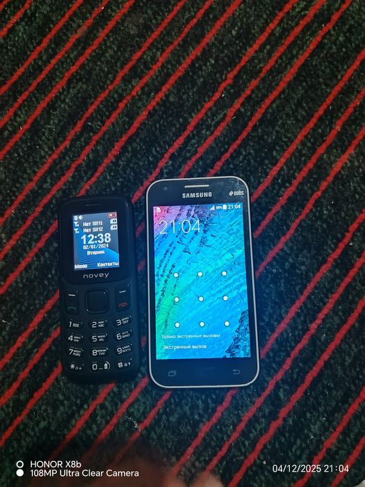 Novey M 185  Samsung J100