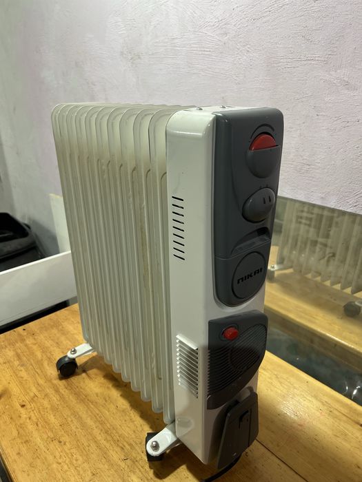 Масленный обогреватель