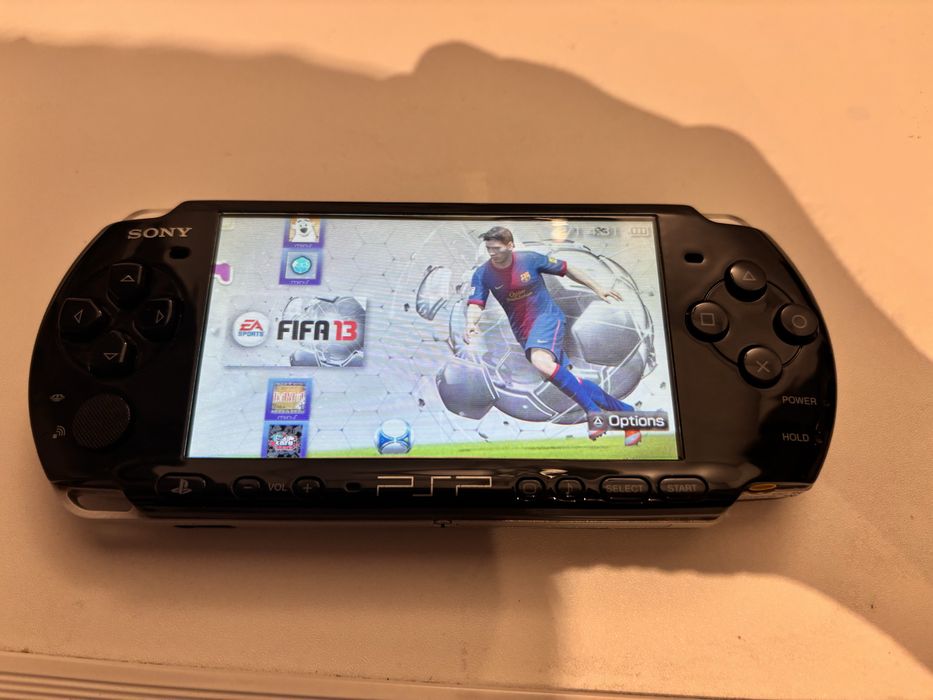 Sony Psp 3000 modat , card 64G, peste 140 de jocuri
