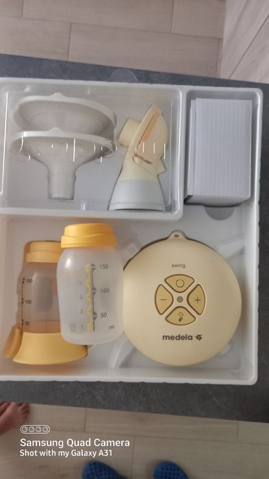 Помпа за кърма medela sling flex