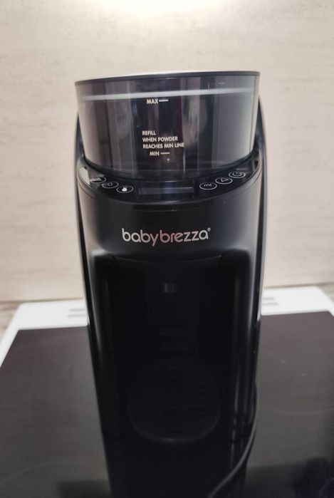 Baby brezza машина за мляко