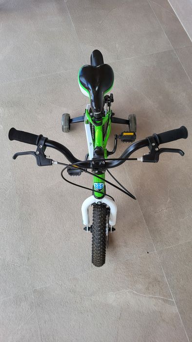Bicicleta  copii 2-4 aniKidsCare,12 inch
Bicicleta pentru copii 2-4 ani HappyCycles KidsCare, roti 12 inch, cu roti ajutatoare si frane pe disc, verde