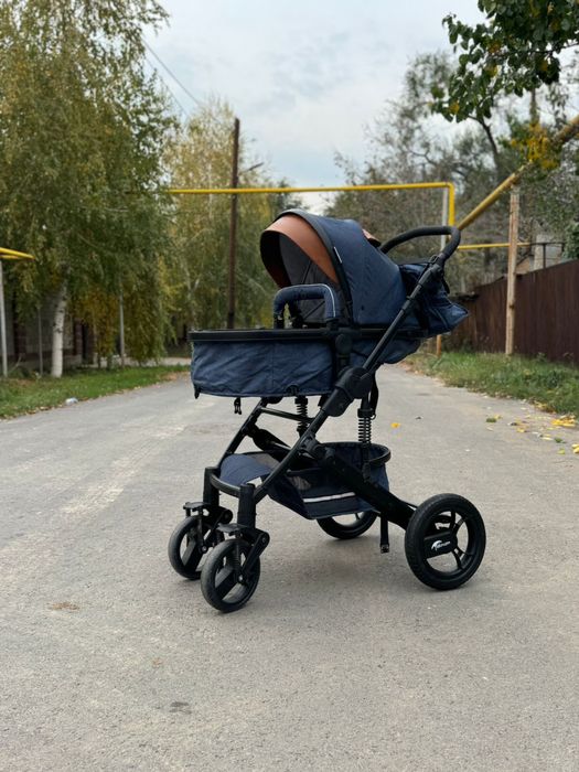 Детская прогулочная коляска трансформер