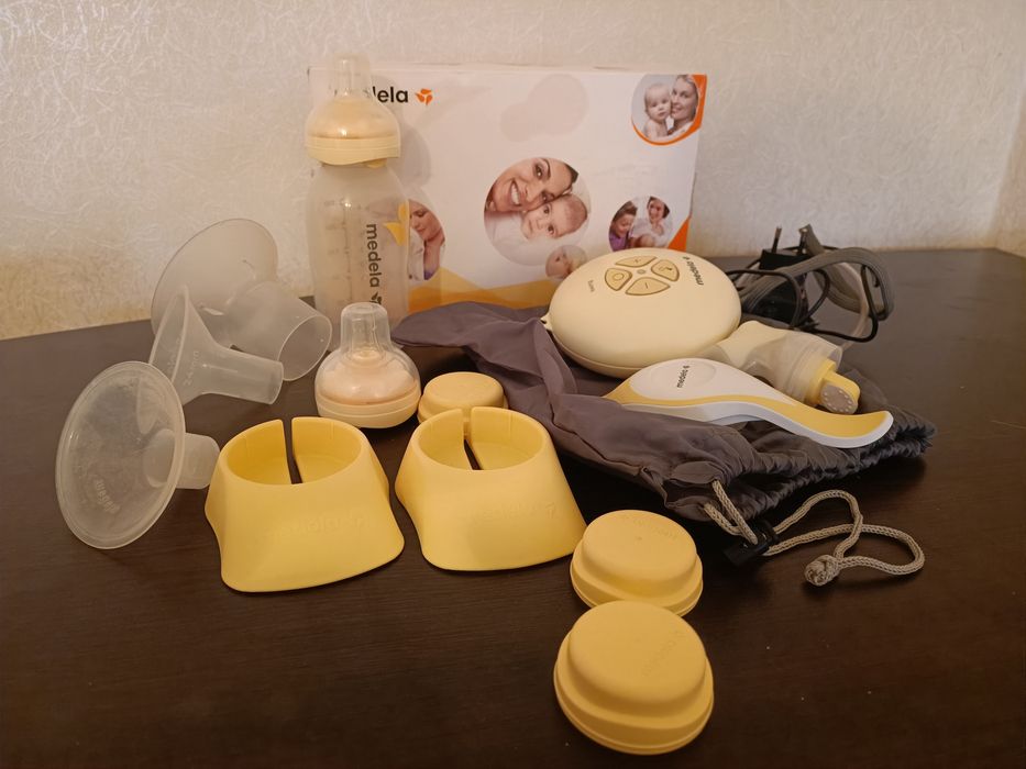 Medela електрическа и ръчна помпа + шише