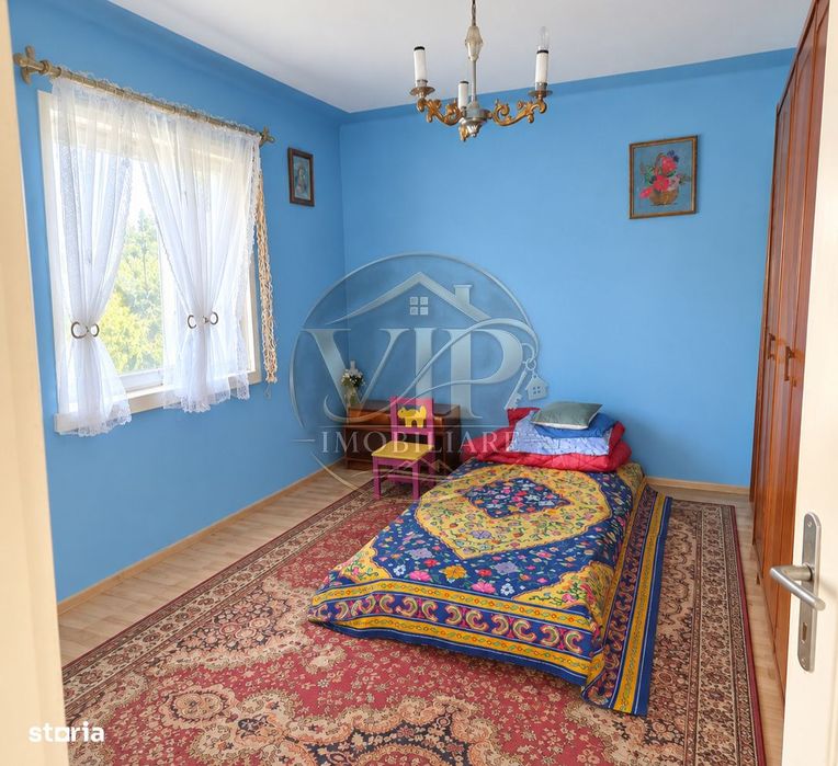 Casa individuala cu 4 camere,1130 mp teren,Intregalde