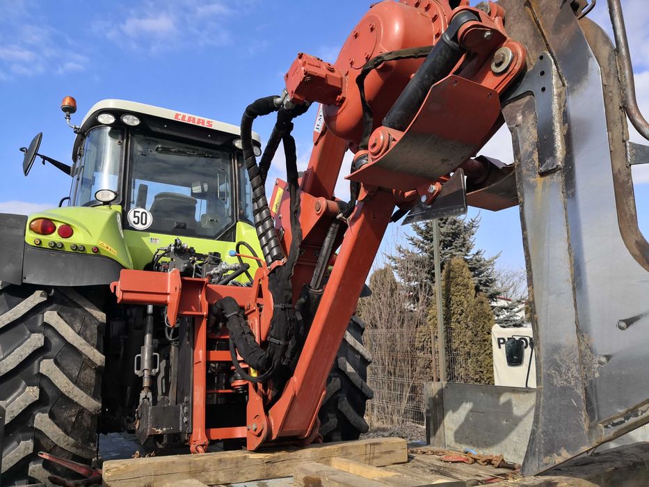 Inchiriere Tractor Claas Axion Vario cu atasamente plug vibrator si trencher Ditch Witch