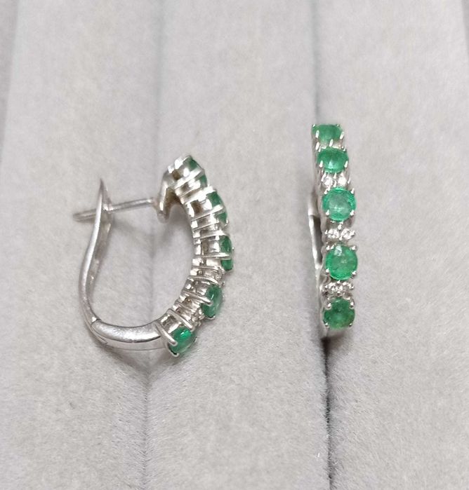 Продам серьги с изумрудами