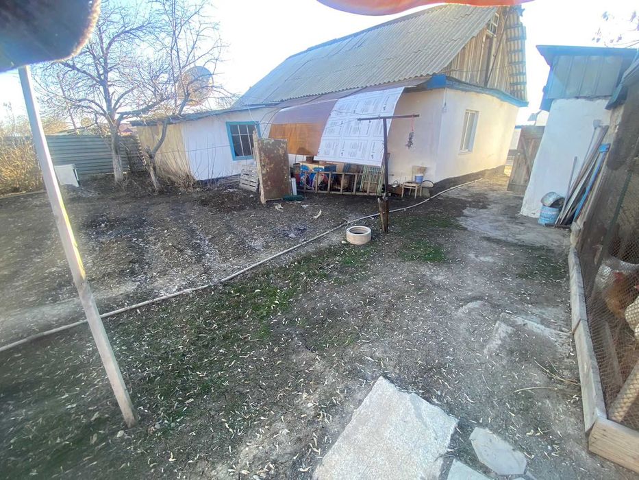 Дом на Бугре, Танат Империя