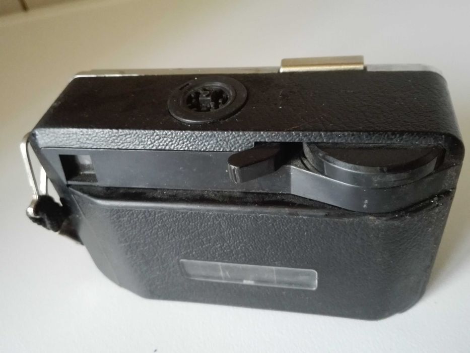 Три фотоапарата.