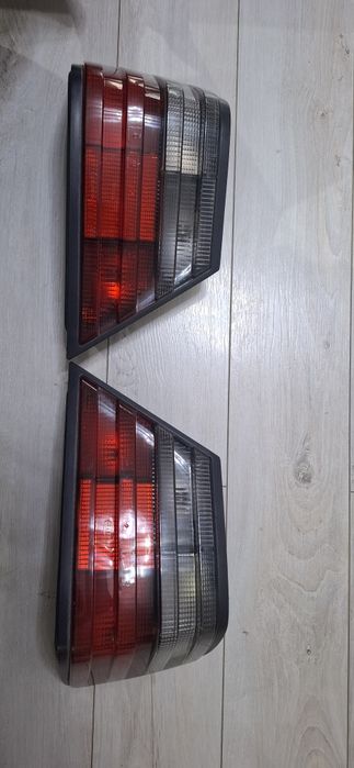 W124 задние стопы HELLA