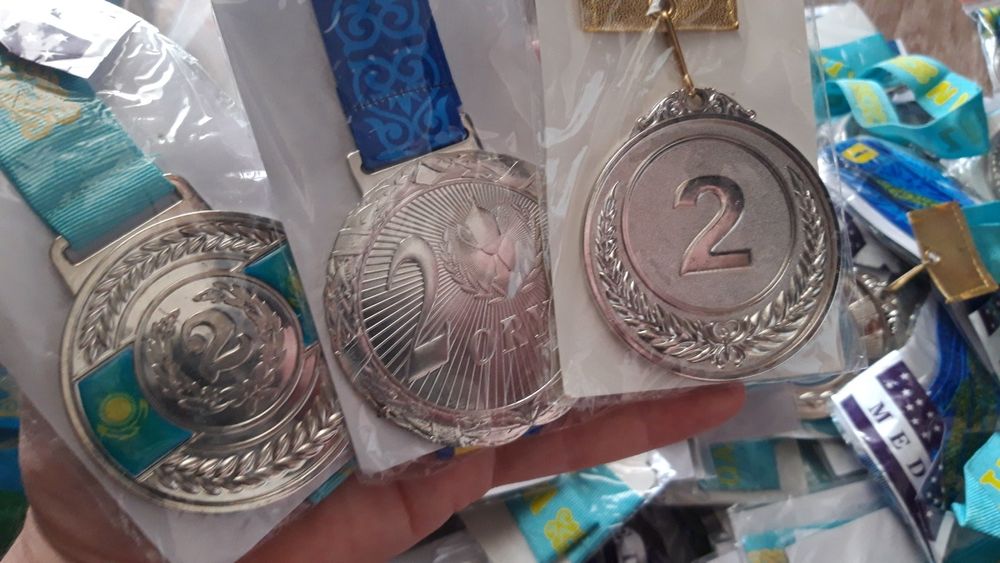 Медаль новая,город